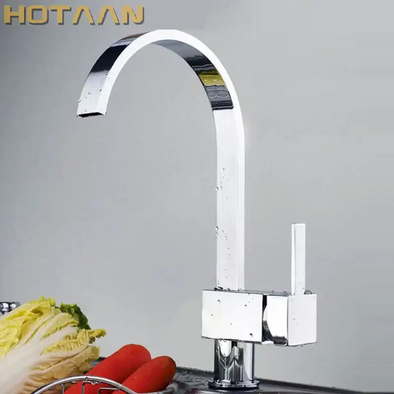 Modern chrome and brass dual hole kitchen tap with chrome finish and minimalist arched design single lever handle