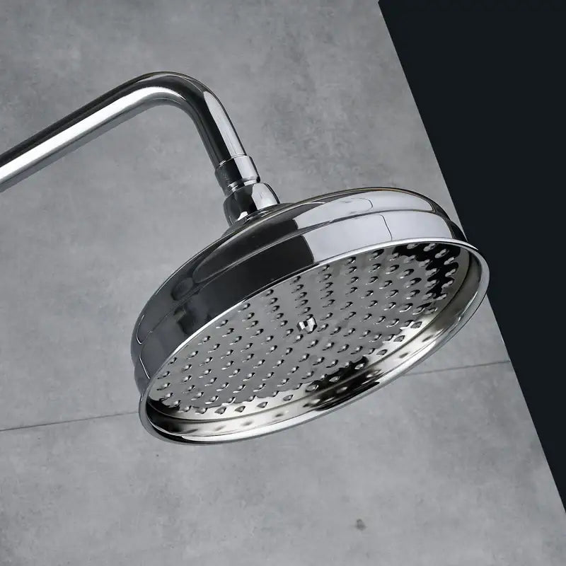 Modern chrome brass shower mixer with rainfall head featuring a round chrome finished showerhead and dual handle design