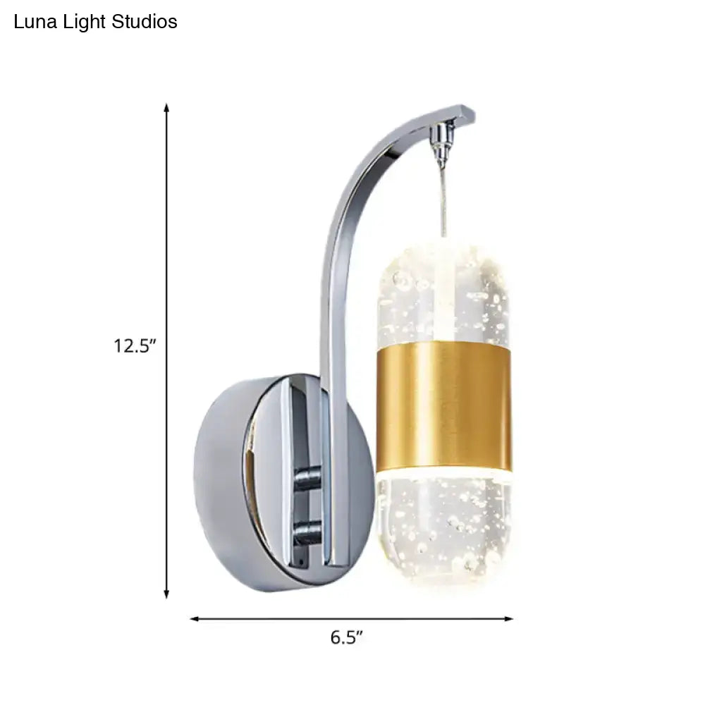 Modern chrome bubble crystal wall light with illuminated glass globe and gold-accented band for restaurant use