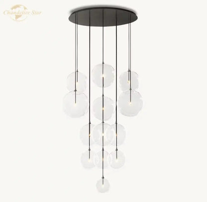 Modern black metal chandelier with cascading clear glass globe cluster for living room decorbites clear glass light
