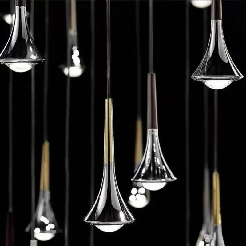 Modern chrome conical led rain pendant lamp with brass trumpet-shaped glass shades for elegant bedroom lighting decorbites lodes rain
