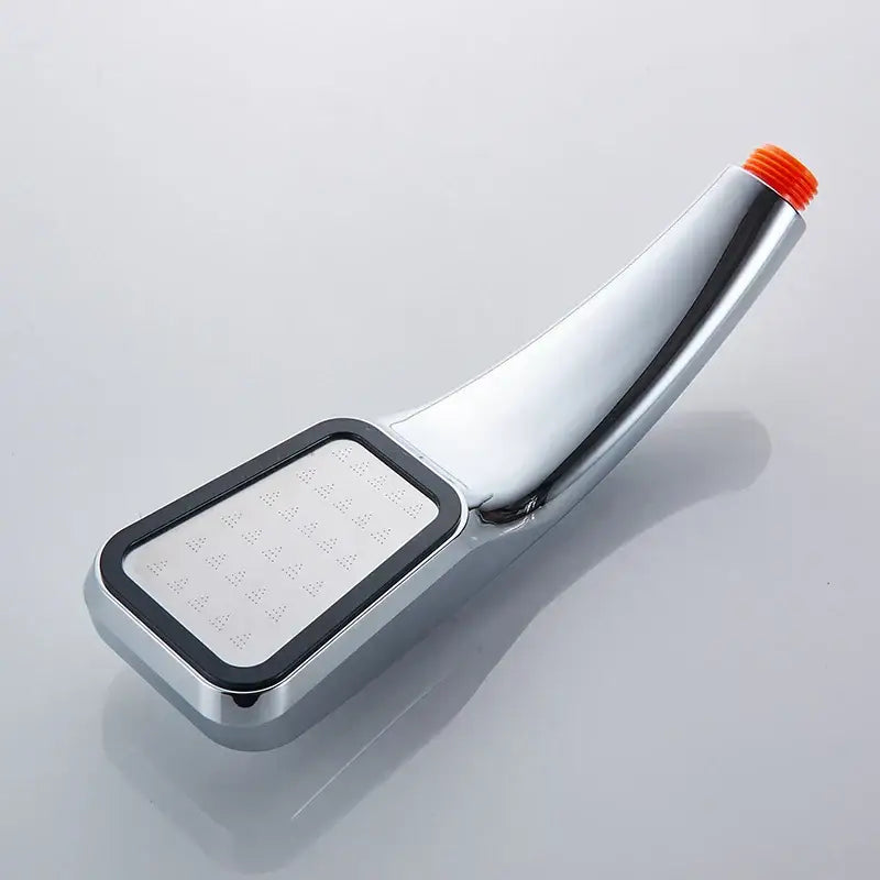 Modern chrome contemporary shower head handheld spray with rectangular nozzles and orange threaded cap for pressure boost