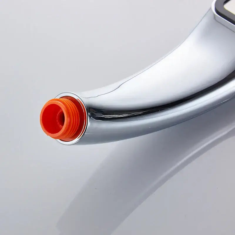 Modern chrome contemporary shower head bathroom pressure boost with chrome faucet and bright orange threaded connector