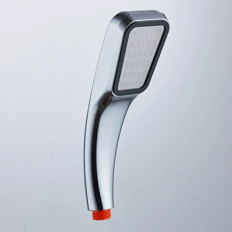 Modern chrome contemporary shower head with a rectangular spray face multiple nozzles and orange threaded base for pressure boost