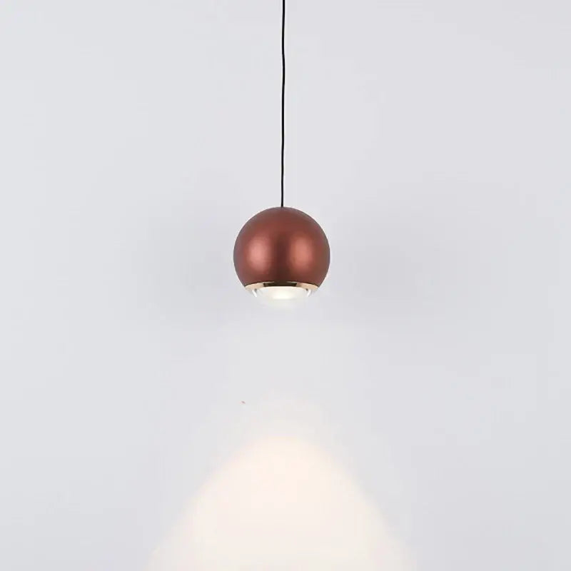 Modern chrome and copper ball pendant light with copper finish and warm glow for dining room chandelier lighting