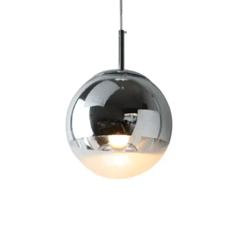 Modern chrome and copper glass ball led pendant light with reflective metallic surface and warm-toned diffuser for dining room