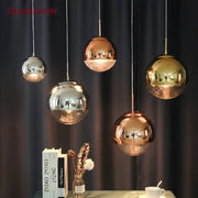 Modern chrome and copper glass ball led pendant light with polished spheres suspended by thin cords for dining room use