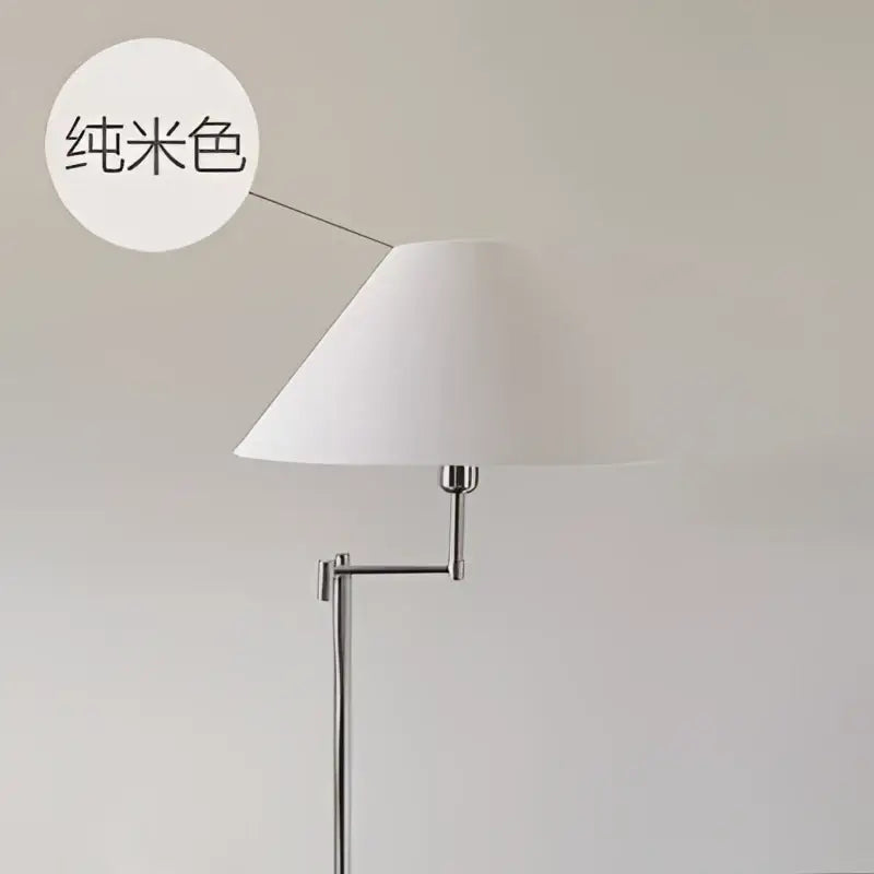 Modern chrome cream rocker arm floor lamp with off-white conical shade and slender chrome stand for living room