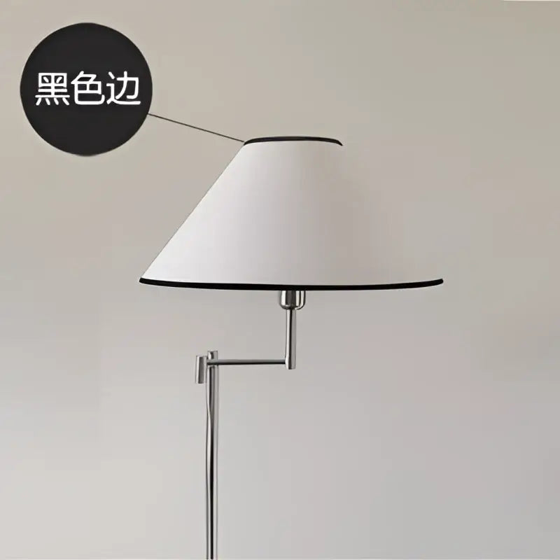 Modern chrome cream rocker arm floor lamp with white conical lampshade and black trim on adjustable chrome stand