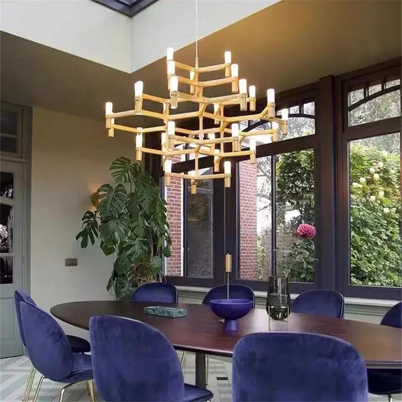 Modern chrome crown major chandelier with golden finish and cylindrical lights in geometric lattice by decorbites crown major