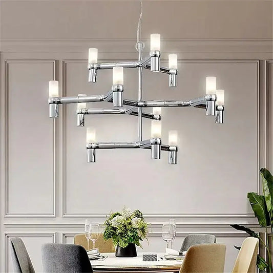 Modern chrome crown major chandelier with cylindrical frosted glass shades in a multi tiered kitchen light design decorbites crown major