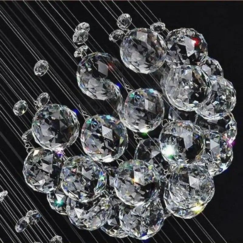 Modern chrome crystal ball chandelier with clear faceted spheres suspended by thin wires for living room decorbites crystal ball
