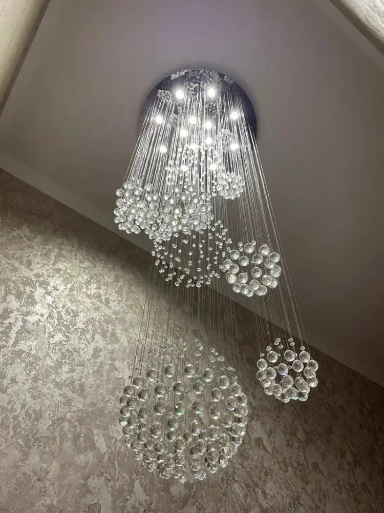 Modern chrome crystal ball chandelier with cascading tiers of clear glass spheres for living room decorbites crystal ball