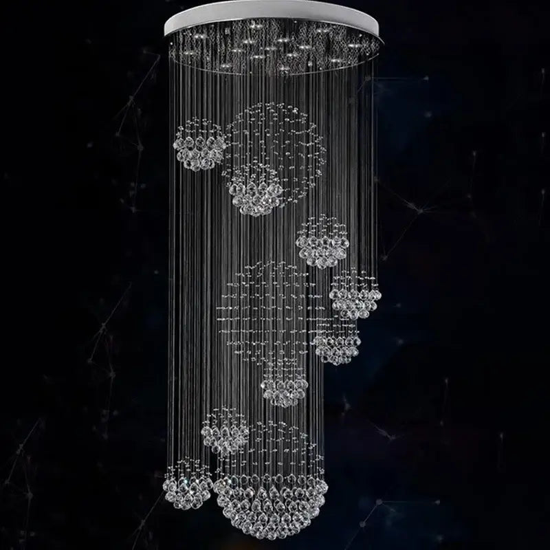 Modern chrome crystal ball chandelier with cascading clear glass beads and white circular mount by decorbites crystal ball