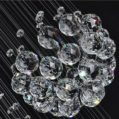 Modern chrome crystal ball design chandelier set featuring a sparkling cluster of clear faceted crystal spheres suspended by thin wires