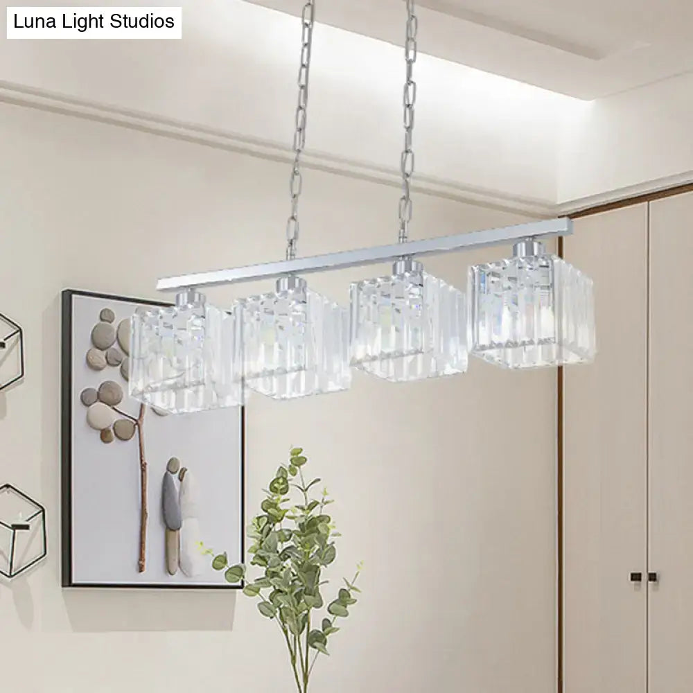 Modern DecorBites™ hanging lamp kit with four clear crystal block shades suspended by silver chains from chrome bar