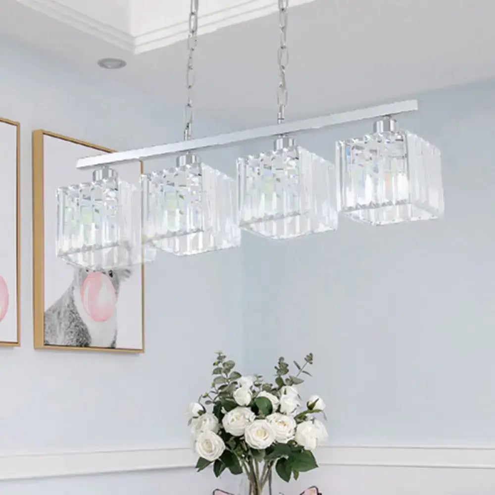 Modern chrome hanging lamp kit with four clear crystal block prisms for elegant indoor lighting