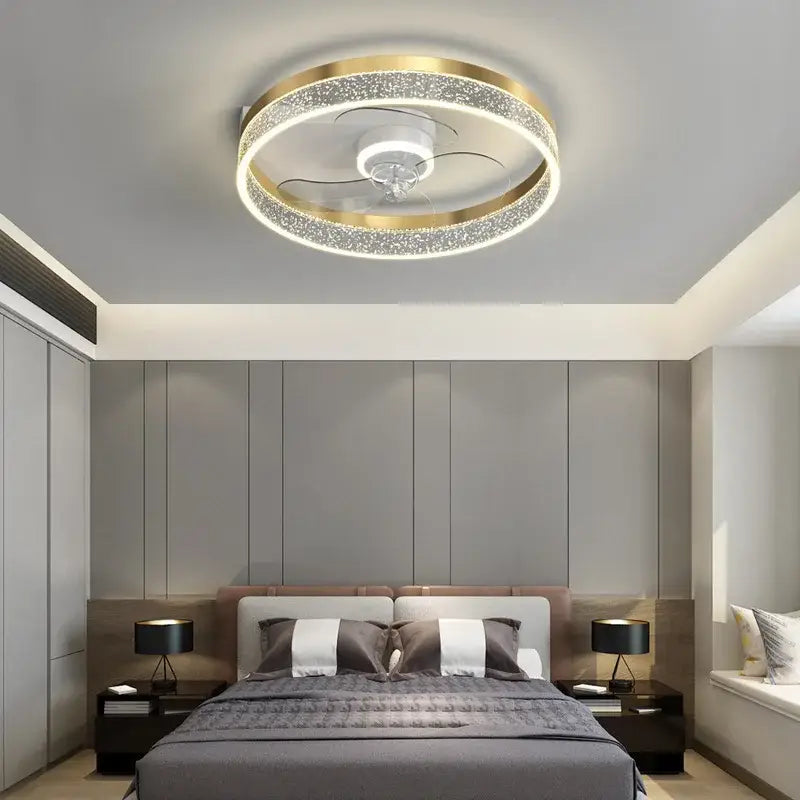 Modern chrome crystal ceiling fan light with gold-toned crystal ring and white motor housing by decorbites ceiling fan