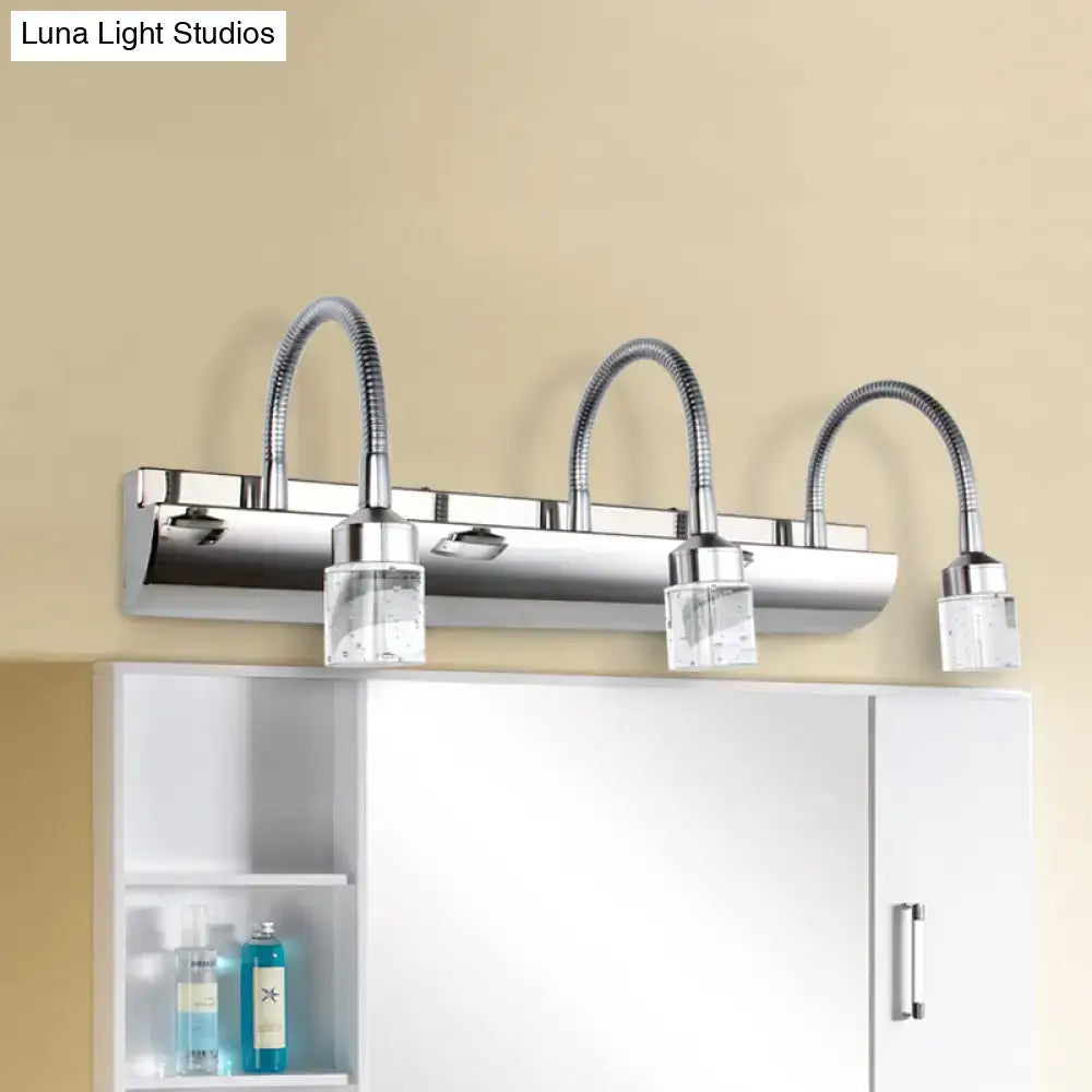 Modern chrome crystal cylinder vanity wall sconce with three flexible gooseneck arms and clear crystal cylinder shades