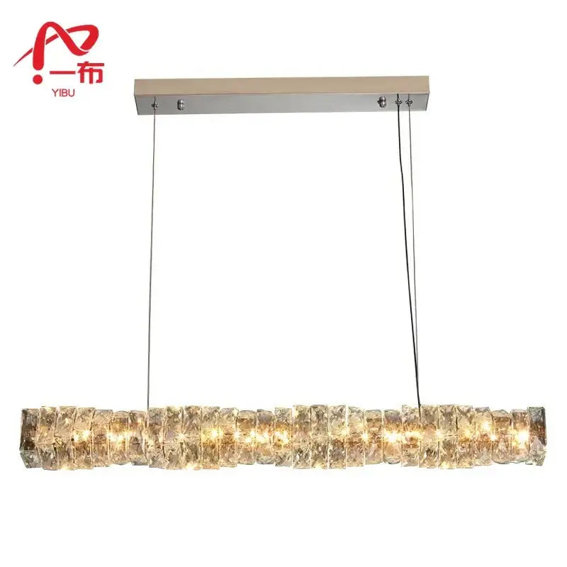 Modern chrome pendant lamp with crystal dining table segments and sleek ceiling mount for kitchen island decorbites crystal dining