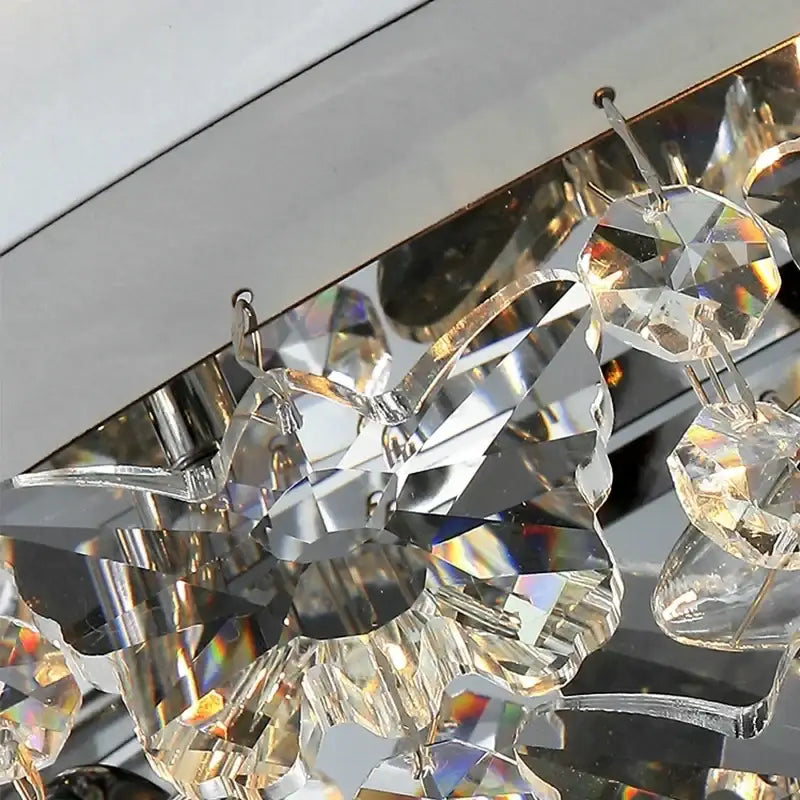 Modern chrome crystal led ceiling chandelier with clear faceted crystals and reflective metallic accents for living room decorbites crystal led