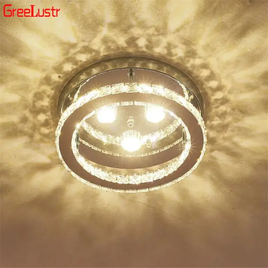 Modern chrome crystal led ceiling light for bedroom with three bright bulbs encased in faceted crystal rings