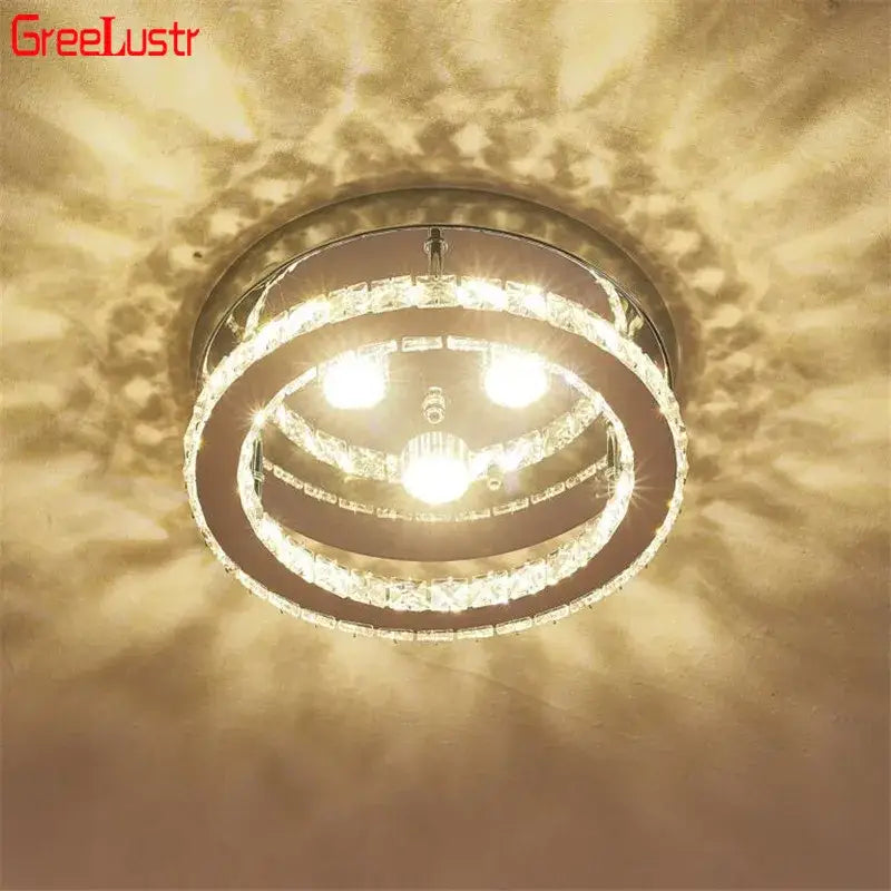 Modern chrome crystal led ceiling light for bedroom with three bright bulbs encased in faceted crystal rings
