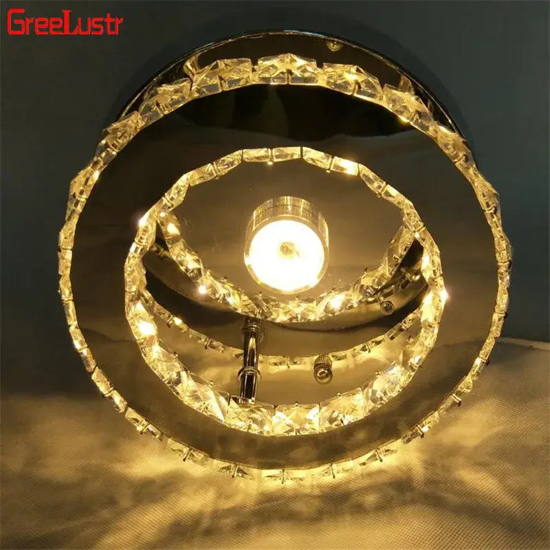Modern chrome crystal led ceiling light featuring a shiny spiral chandelier with clear crystal accents and central illumination