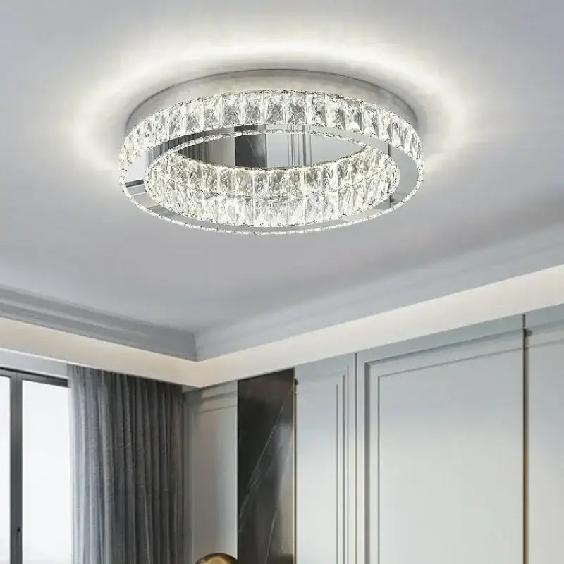 Modern chrome crystal led ceiling light with two concentric faceted rings in sleek frame for living room decorbites crystal led