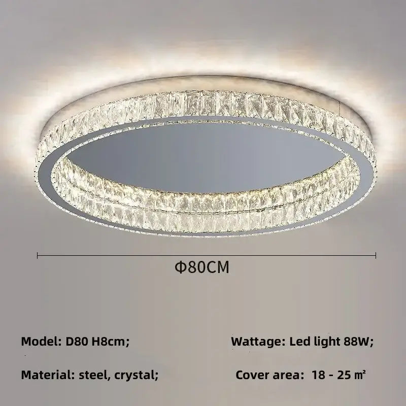 Modern chrome crystal led ceiling light with two concentric faceted crystal rings in steel frame emitting warm light