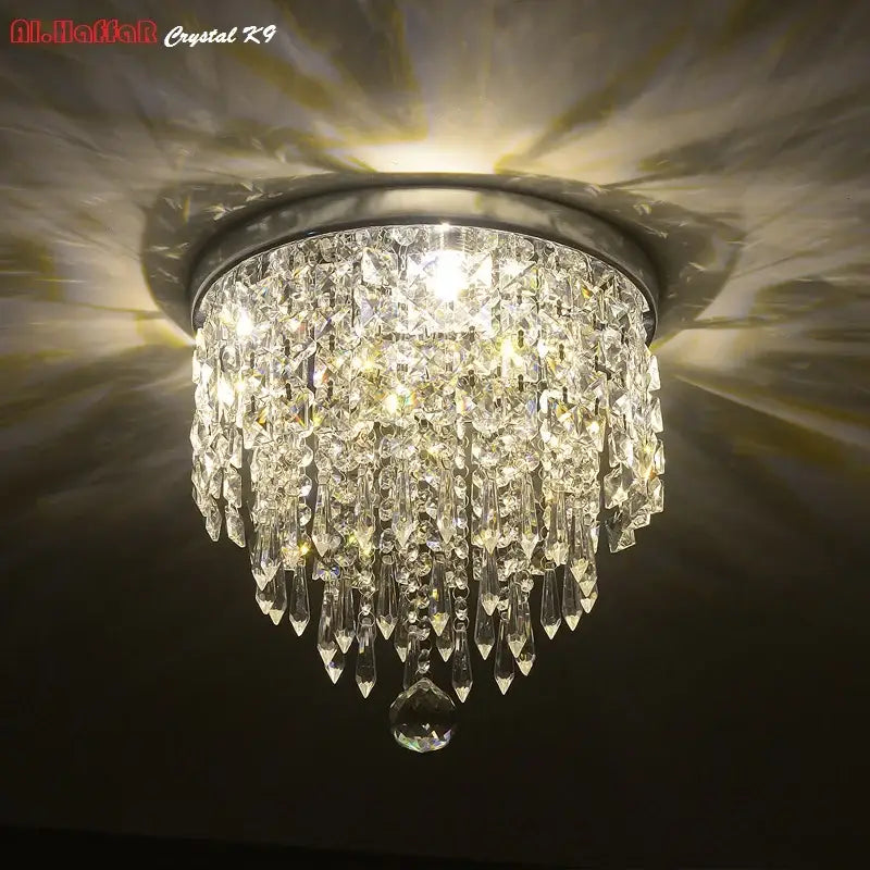 Modern chrome crystal led ceiling light with sleek chrome base and cascading clear crystal droplets for living room decorbites crystal led