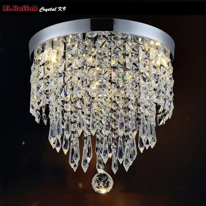 Modern chrome crystal led ceiling light with cascading faceted crystals and central spherical pendant by decorbites