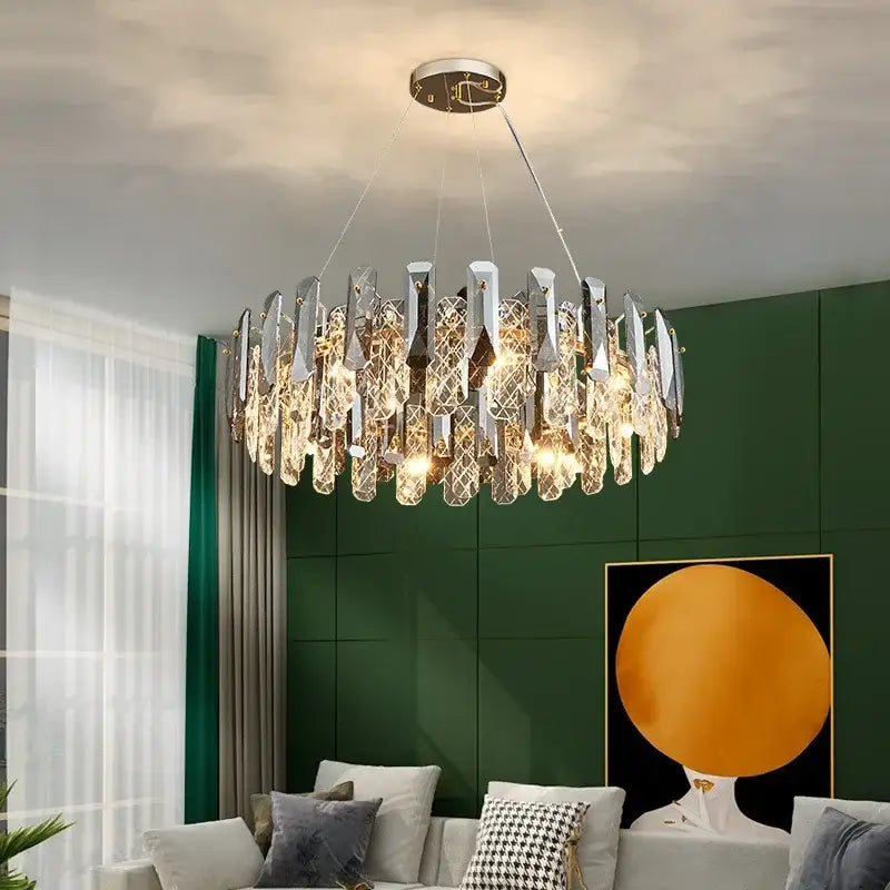 Modern chrome crystal led chandelier with a circular frame and cascading prisms for bedroom pendant light decorbites crystal led