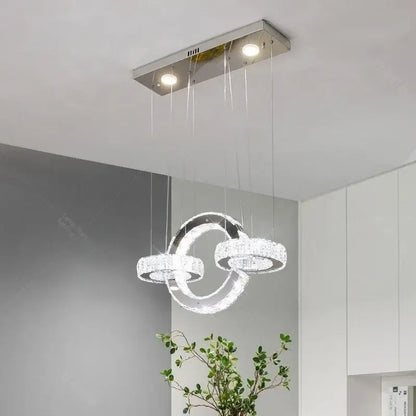 Modern chrome crystal led circle rings chandelier featuring three interlocking crystal led circle rings for bedroom decorbites decor