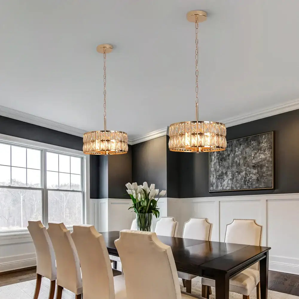 Two elegant gold-toned decorbites crystal led pendant chandeliers with cascading crystal tiers for dining room decor