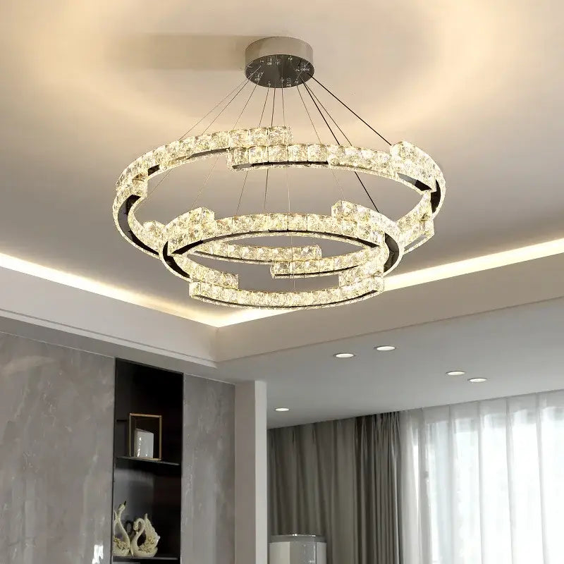 Modern chrome crystal led pendant lights with double interlocking rings embedded with clear crystals and a black frame