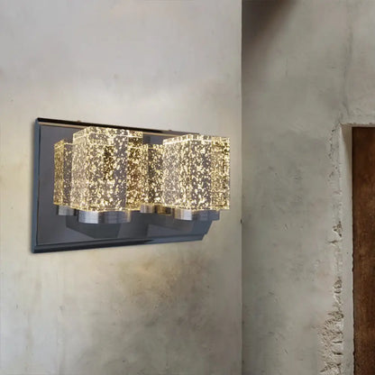 DecorBites™ Lámpara de pared LED moderna con acabado cromado y cristal para dormitorio