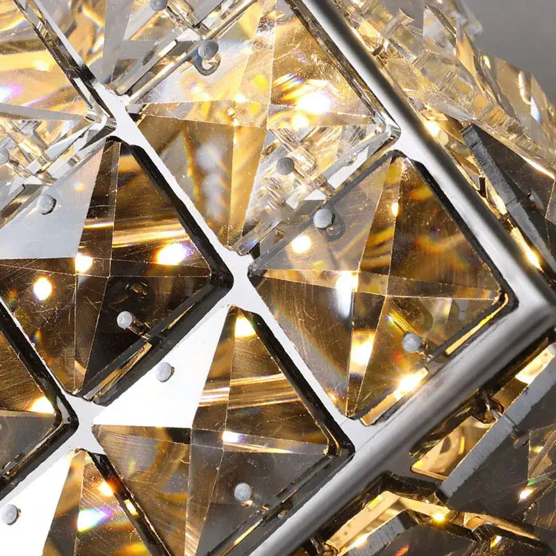 Modern chrome crystal mosaic wall lamp featuring faceted clear and gold-toned glass prisms for bedroom decorbites lighting