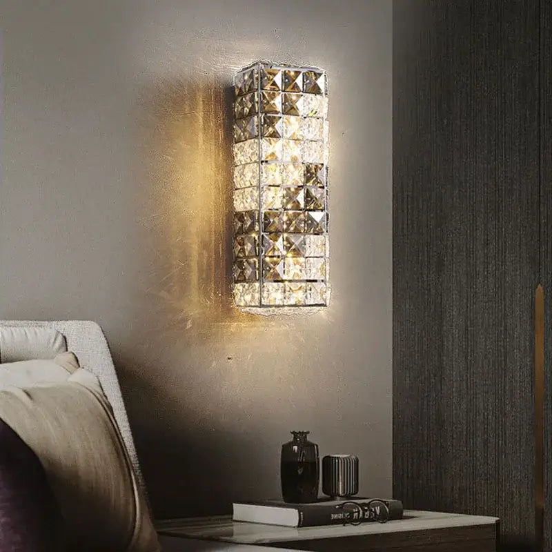 Modern chrome crystal mosaic wall lamp with clear faceted squares emitting warm glow for bedroom led lighting decorbites crystal mosaic