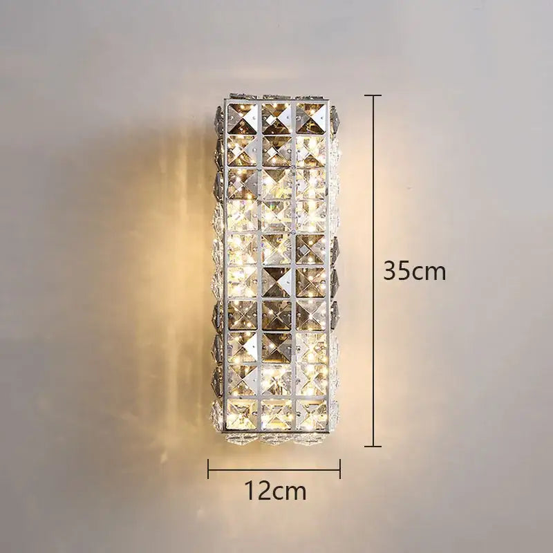 Modern chrome crystal mosaic wall lamp featuring faceted crystal squares in a polished chrome frame for bedroom decorbites lighting