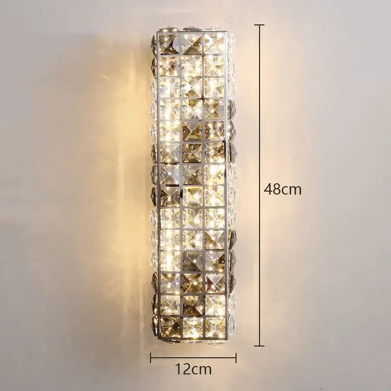 Modern chrome crystal mosaic wall lamp with clear and gold-toned facets in polished silver frame for bedroom lighting
