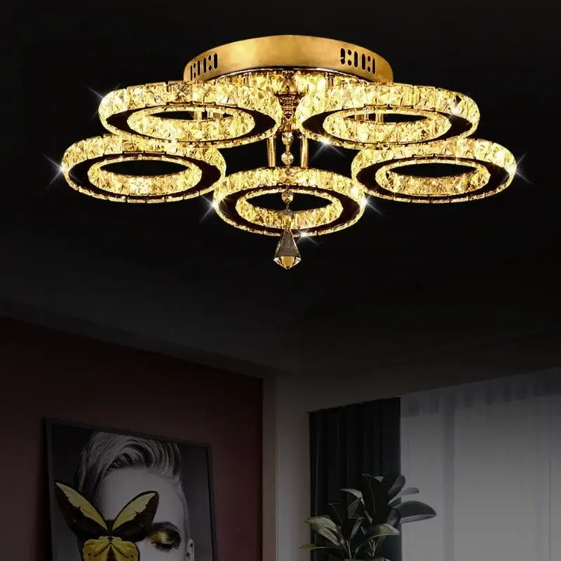 Modern chrome crystal nordic led ceiling chandelier with golden crystal rings and central teardrop pendant for living room