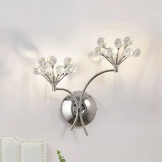 Modern chrome crystal orb wall sconce direct wired electric light fixture with two branching arms and clear crystal spheres