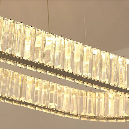 Modern chrome crystal oval led chandelier with clear rectangular prisms on a sleek metallic frame for living room decorbites crystal oval