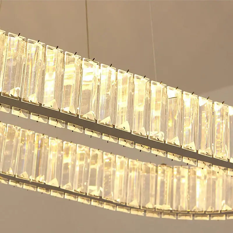 Modern chrome crystal oval led chandelier with clear rectangular prisms on a sleek metallic frame for living room decorbites crystal oval