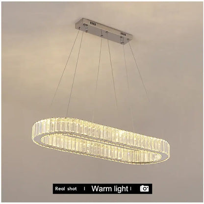 Modern chrome crystal oval led chandelier with sleek chrome finish and warm glowing light for luxury living room decorbites crystal oval