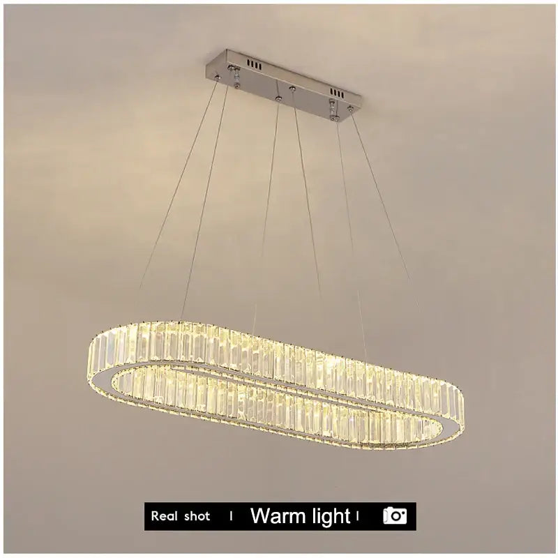 Modern chrome crystal oval led chandelier with sleek chrome finish and warm glowing light for luxury living room decorbites crystal oval