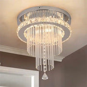 Modern chrome crystal raindrop chandelier with clear glass prisms and faceted crystals ceiling light for dining room decorbites