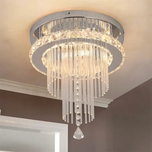 Modern chrome crystal raindrop chandelier with clear glass prisms and faceted crystals ceiling light for dining room decorbites