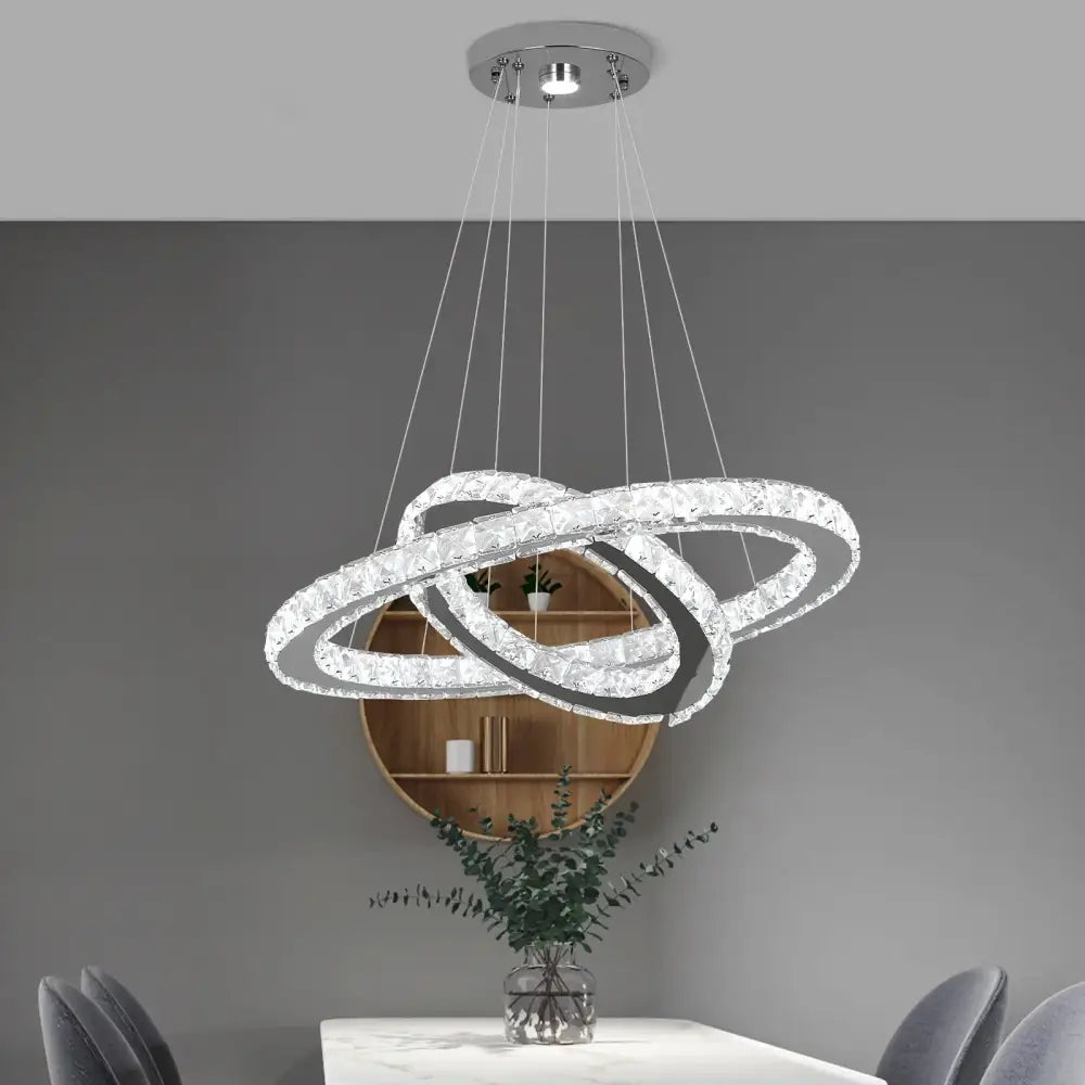Modern chrome crystal ring chandelier with three interlocking crystal rings pendant light for dining room decorbites decor